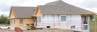 House under construction by contractors